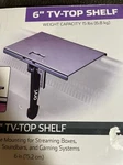Device Shelf, Onn 6 Inch Tv-top Capacity 15LBS. Fixed Price $12.99.