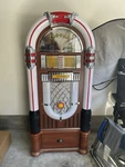 Crosley Full Size Bluetooth Jukebox With Cd Player Stand. Fixed Price $1500.00.